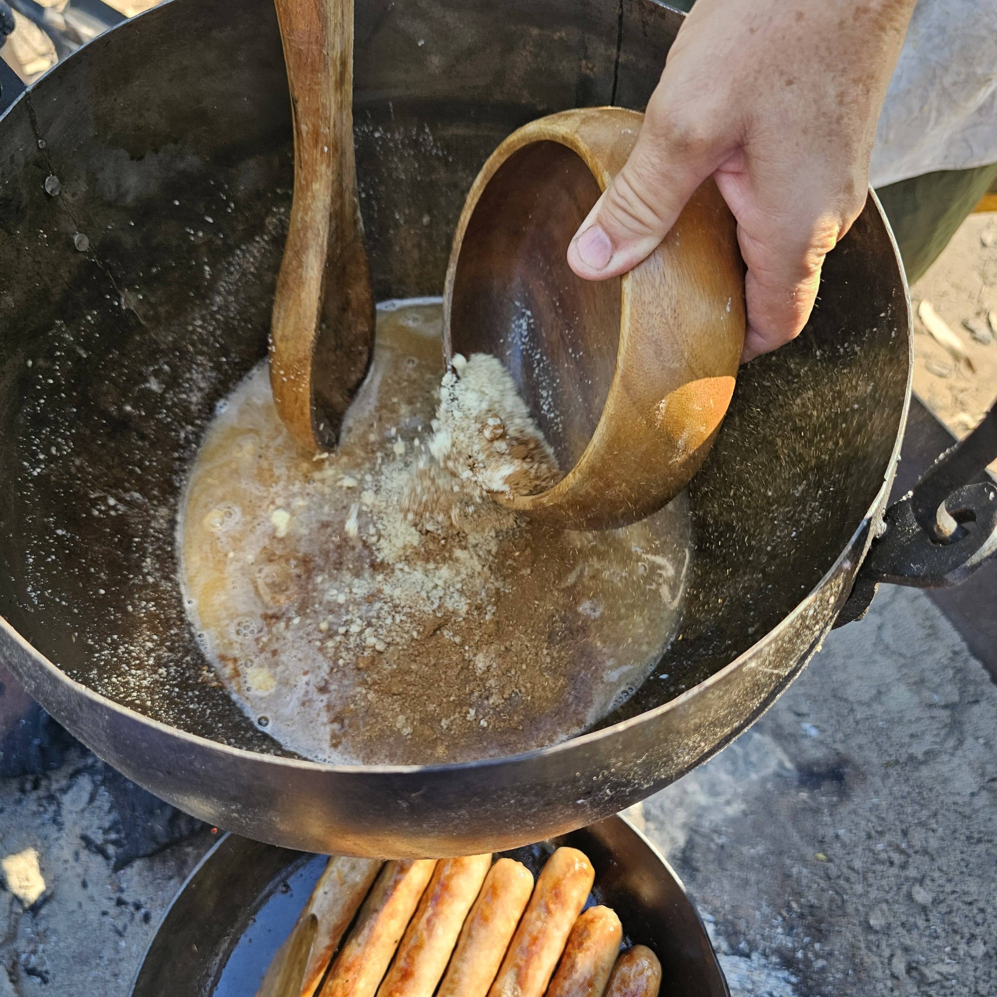 Preparing dough in camp kitchen