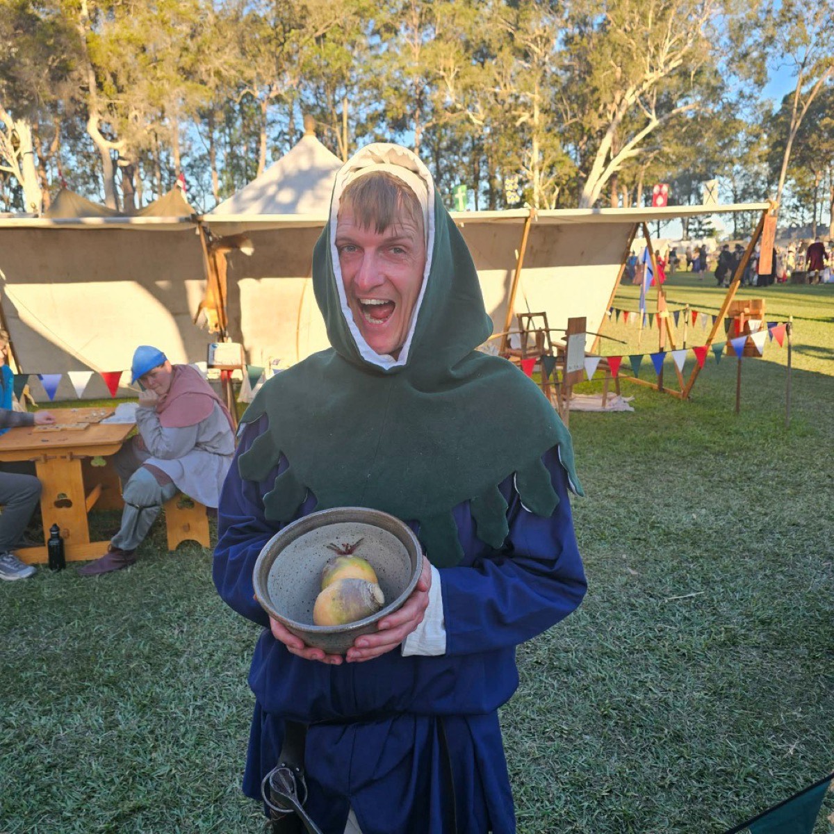 Jackson Stanton the Turnip Farmer holding a bowl of turnips